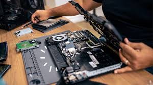 MacBook and laptop hardware repair services in Dubai - screen replacement, battery replacement